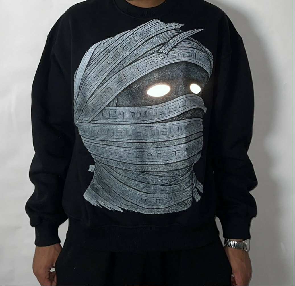 “Luminous Mummy Black crewneck
